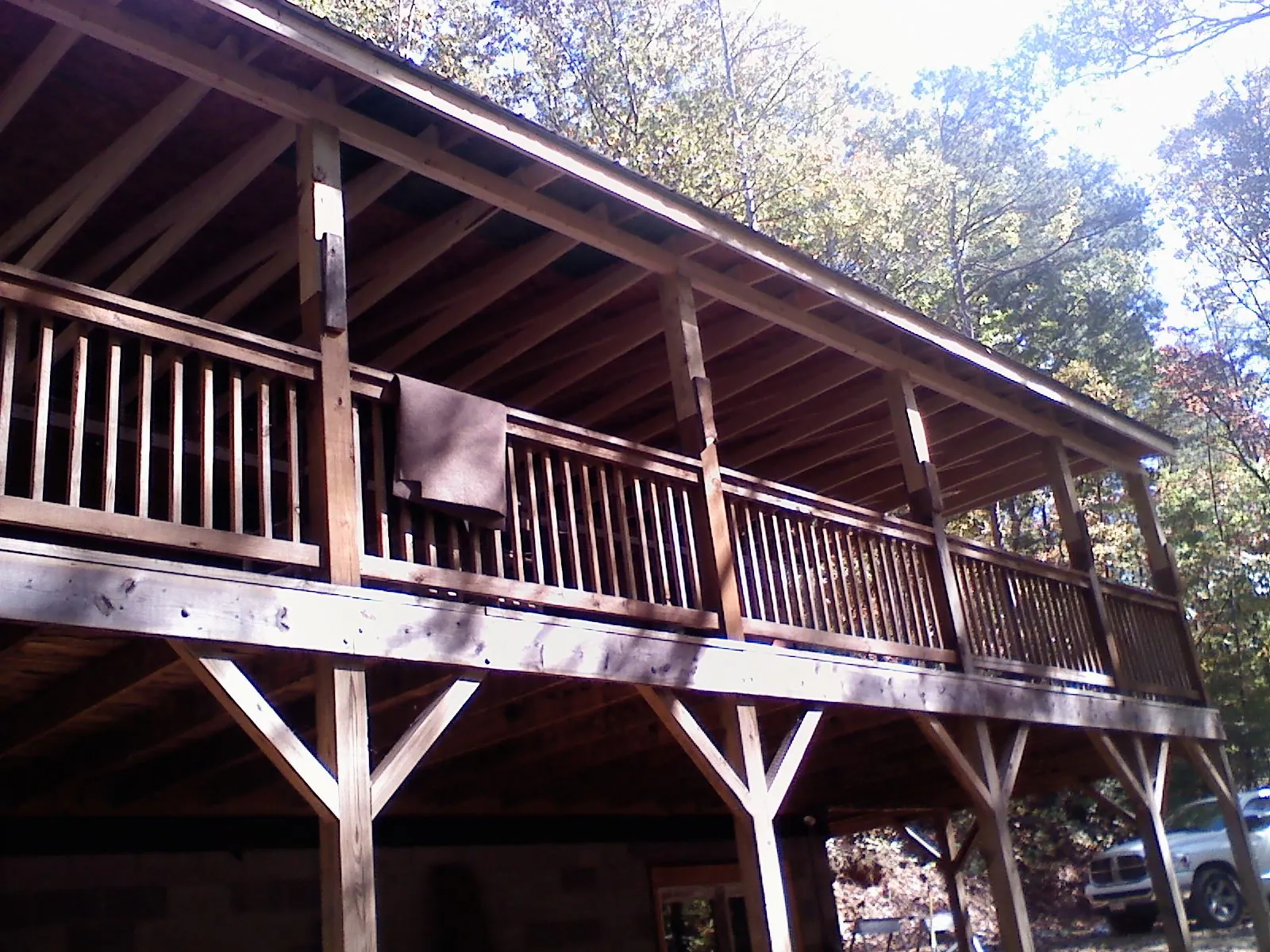 Timber framing under a new elevated porch and deck — Roof Leak Repair in Boalsburg by Roofing Brothers